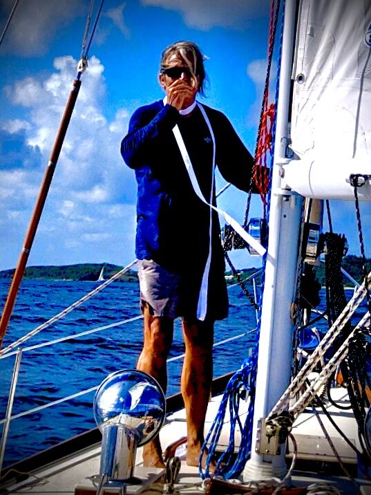 Rufus Pennington on the foredeck underway
